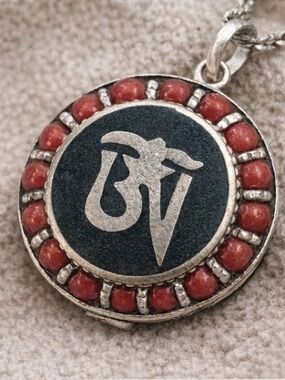 Tibetan Om Pendant With Hidden Storage Coral Inlay Handcrafted in Tibet